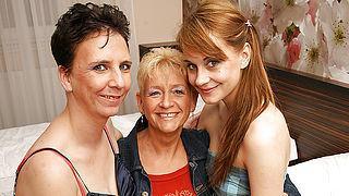Three old and young lesbians make out