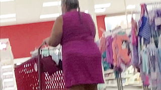 Thick Latina granny in short dress bending over without panties