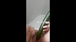 Grandma Heidi plays with the cucumber